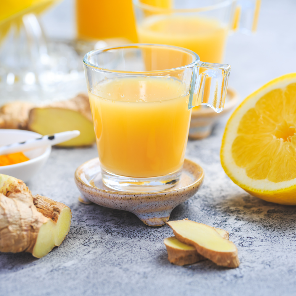 Close-up of ginger turmeric shots showing vibrant color and fresh ingredients