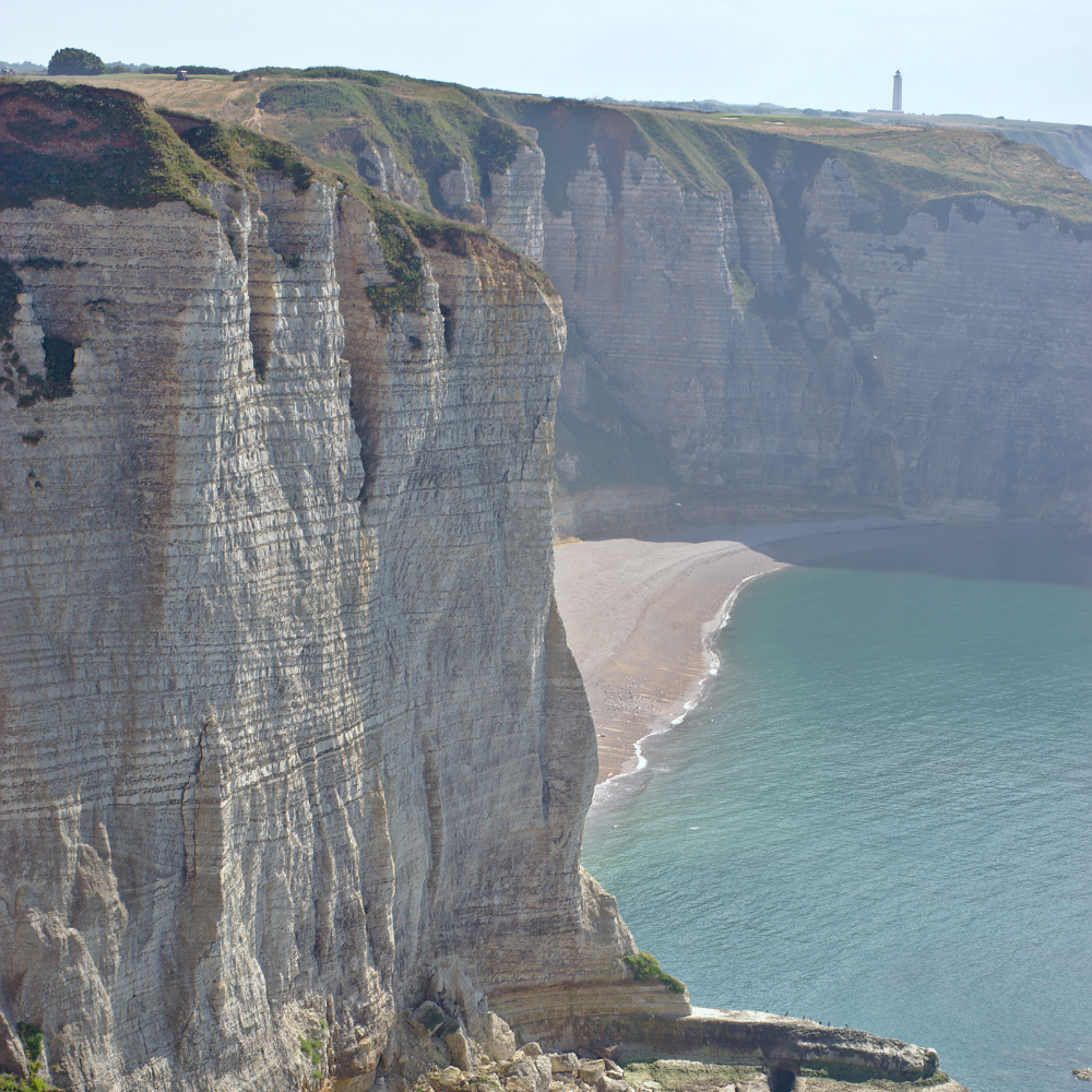 Étretat cliffs in Normandy France with dramatic white arches, ocean views, and coastline