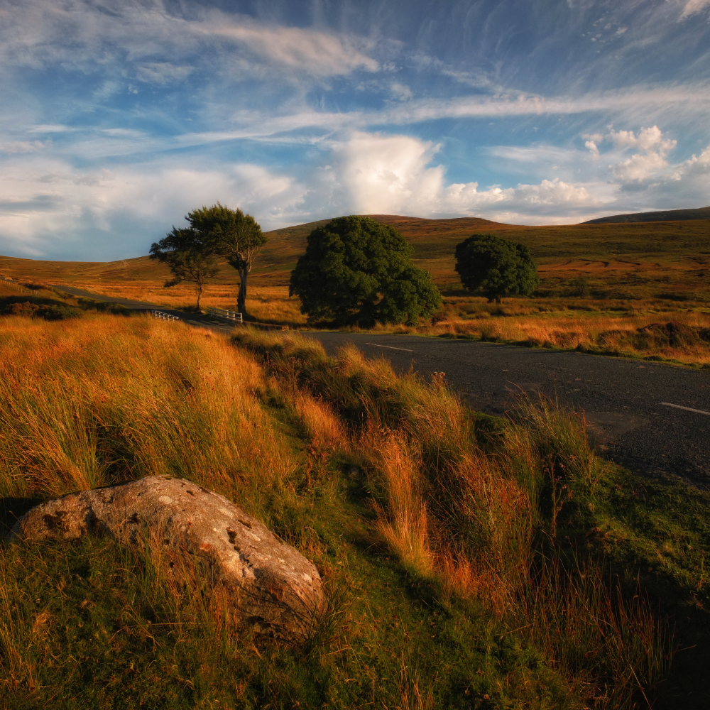Sweeping view of rolling hills and roads in the Wicklow Mountains