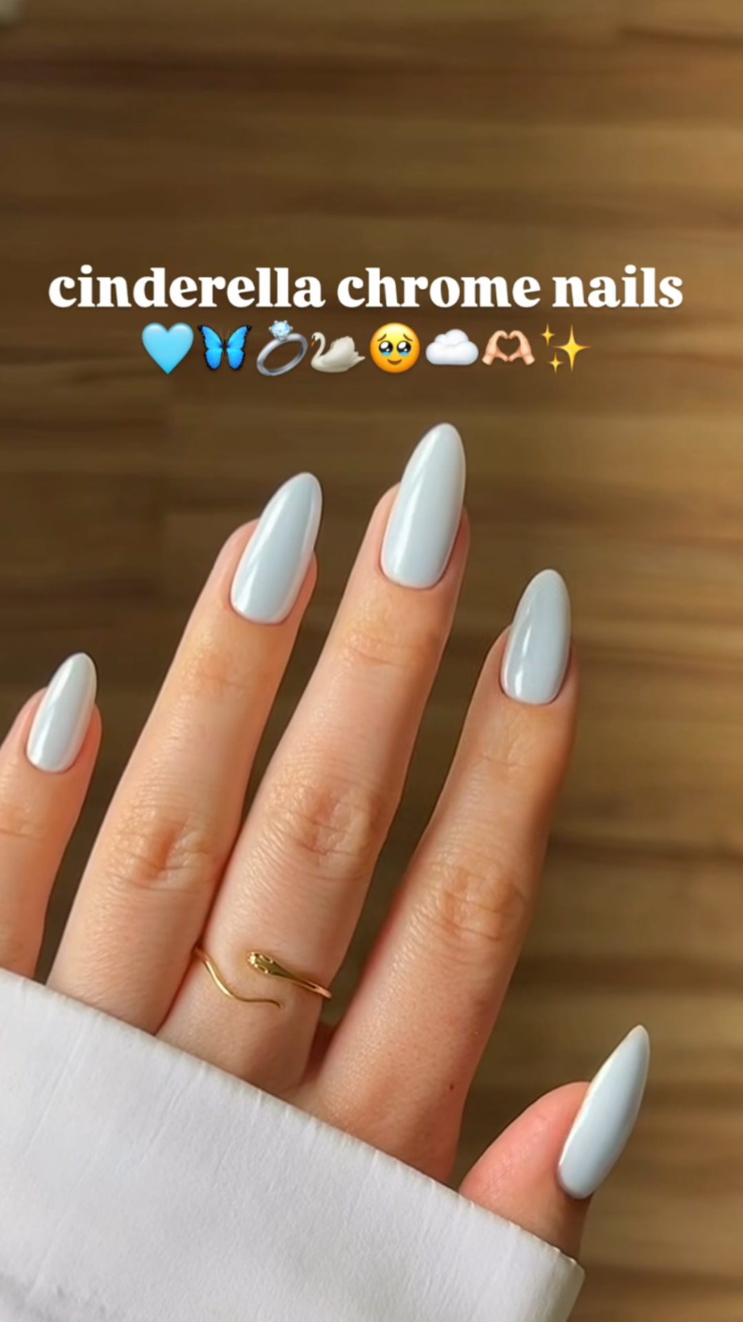 Ice blue spring nails with glossy finish and clean minimalist style