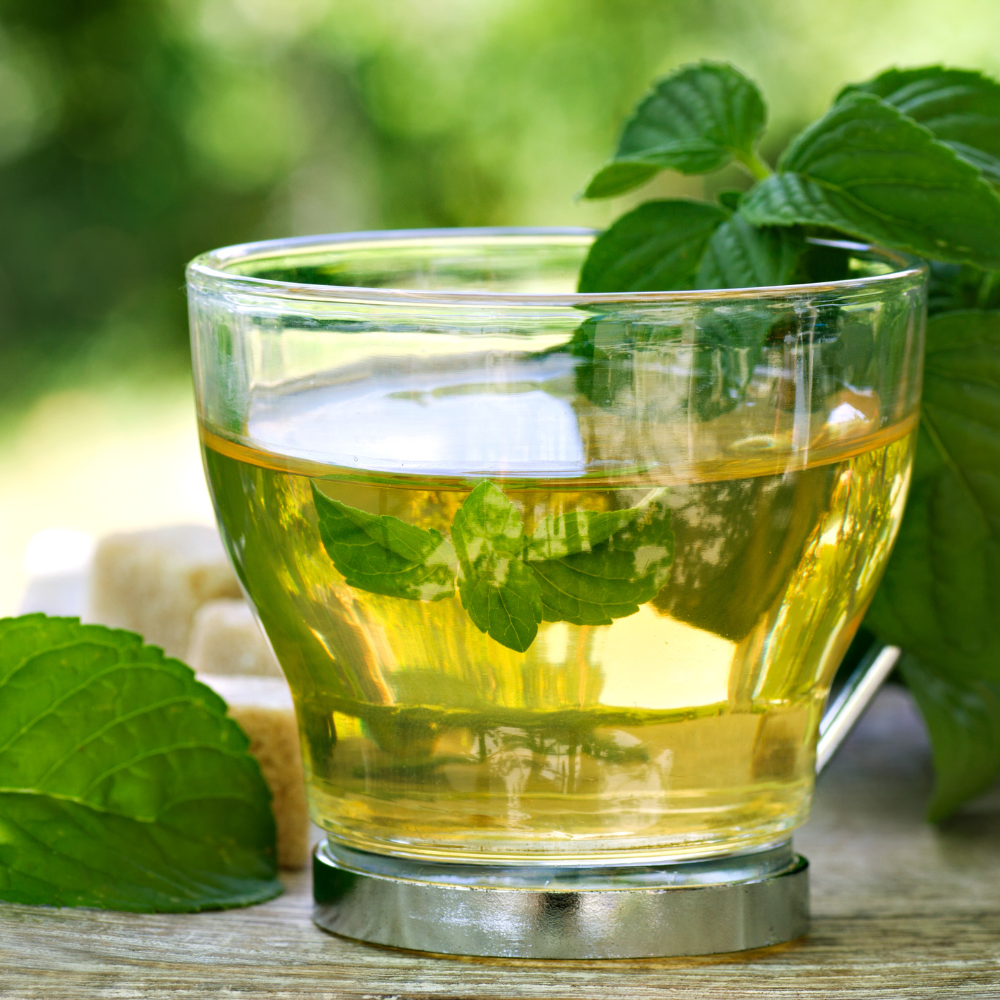 Homemade herbal tea made from blends with dried herbs, flowers, and loose-leaf teas.
