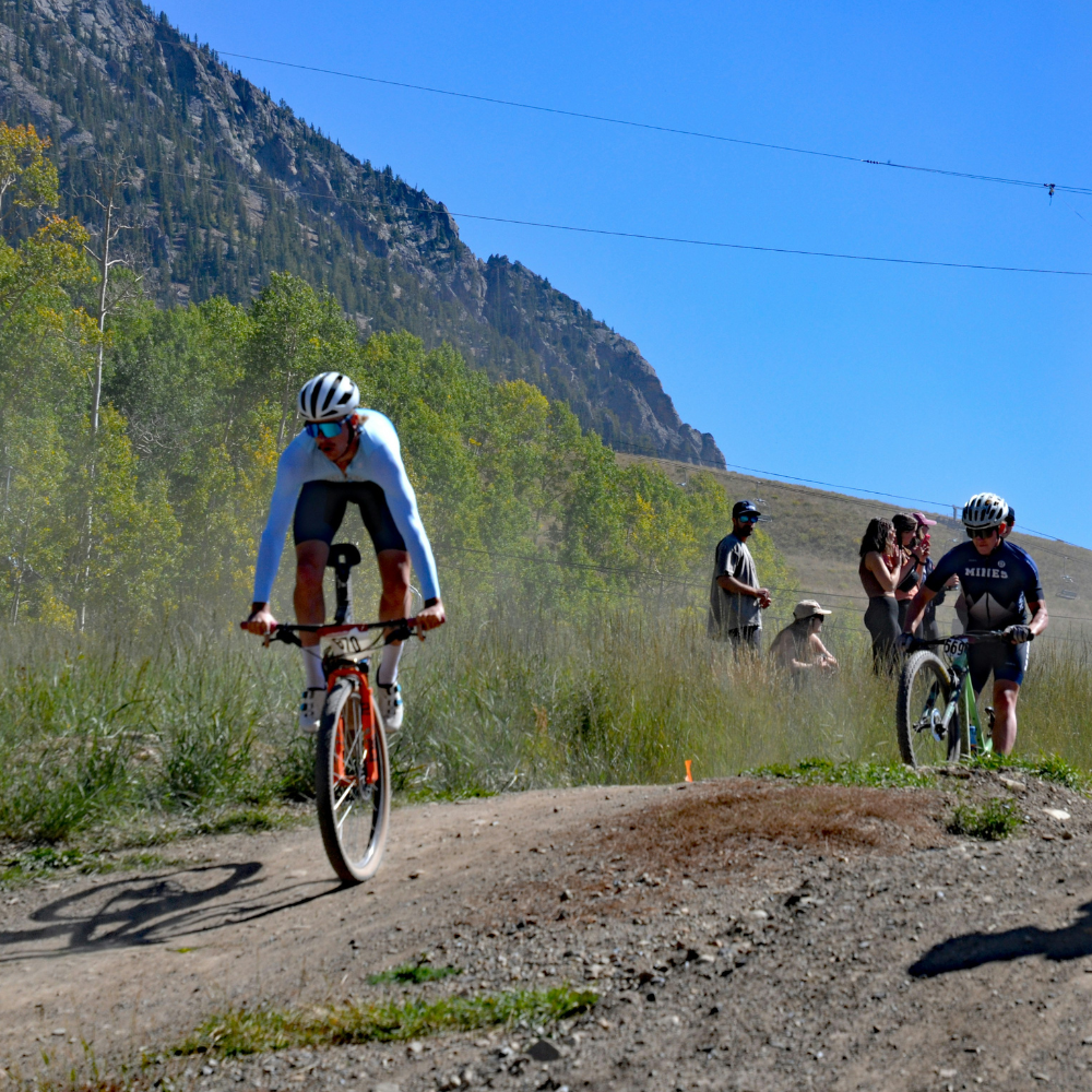 Mountain biking through wildflower meadows in Crested Butte, Colorado