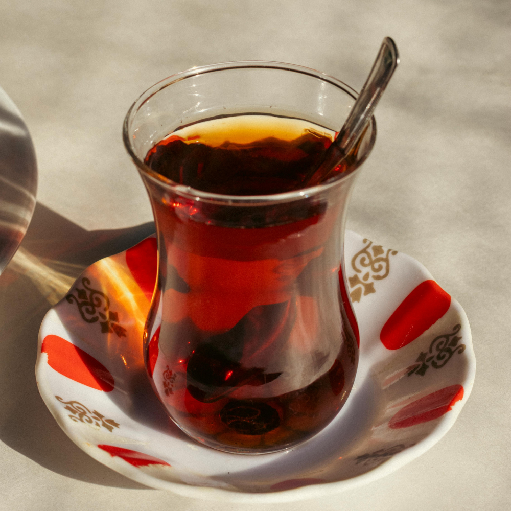 Clove water steeping overnight in a glass jar