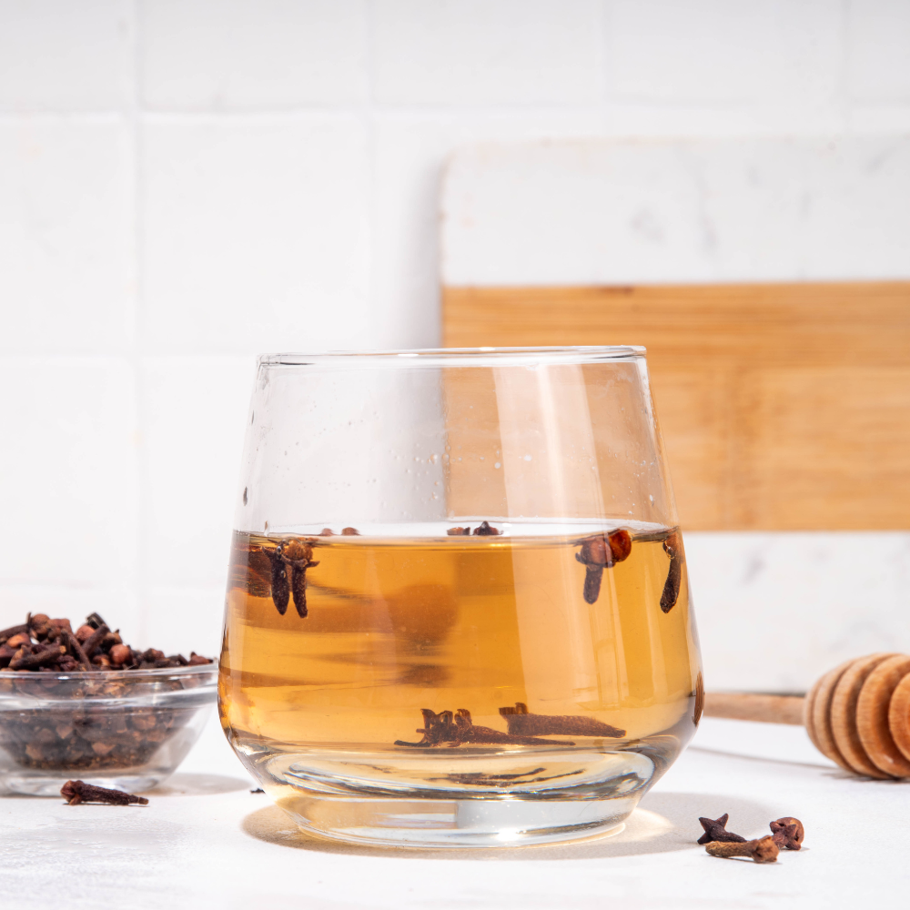 Clove detox water recipe for digestion, inflammation, and natural detox support