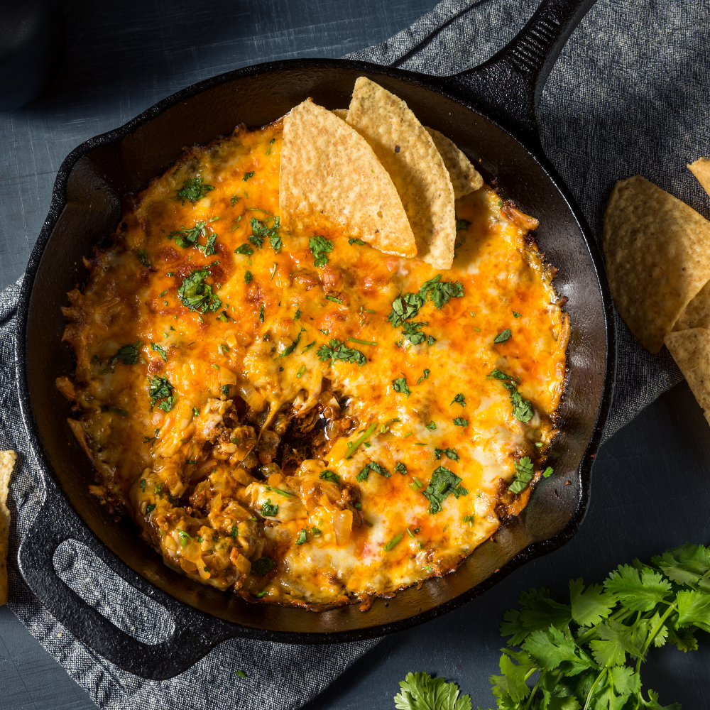 Creamy jalapeño queso dip, a spicy crowd-pleasing party dip for Super Bowl and game day.