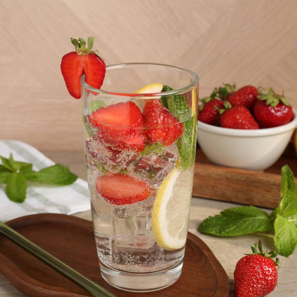 Strawberry basil coconut water drink made with fresh strawberries and basil leaves for a refreshing summer beverage.
