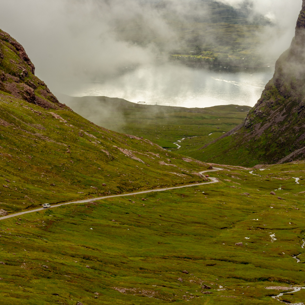 Dramatic Highlands landscape along one of the best road trips in Europe in Scotland.