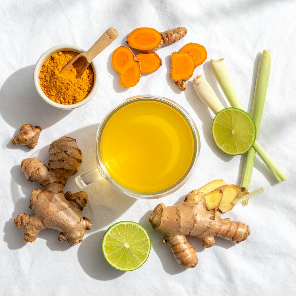 Fresh lemons, lime, cayenne pepper, and honey for making a lemon cayenne shot