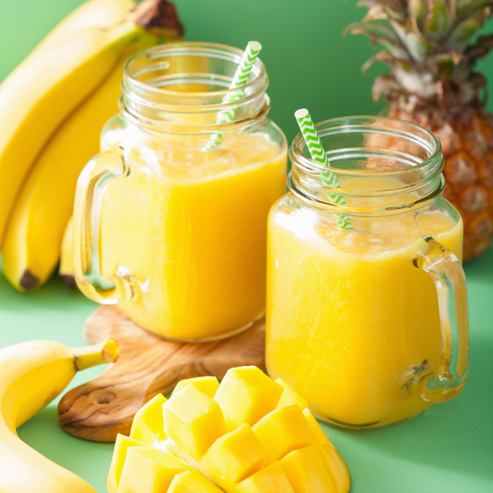 Mango smoothie made with mango, pineapple, banana, and coconut water.
