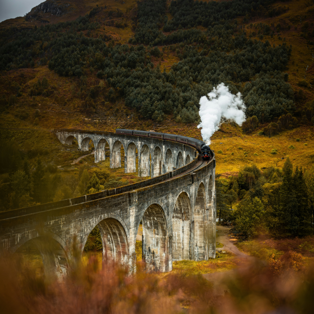 Dramatic Highlands landscape along one of the best road trips in Europe in Scotland.