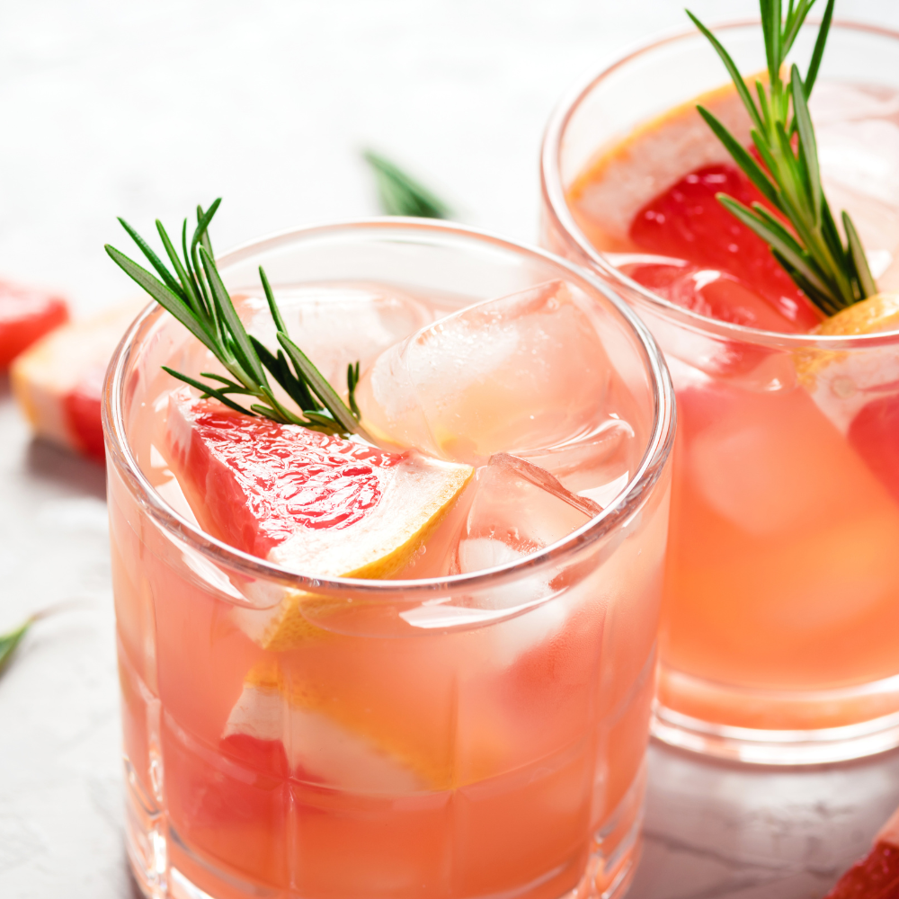 Refreshing grapefruit coconut water drink with fresh citrus juice served over ice for healthy hydration.