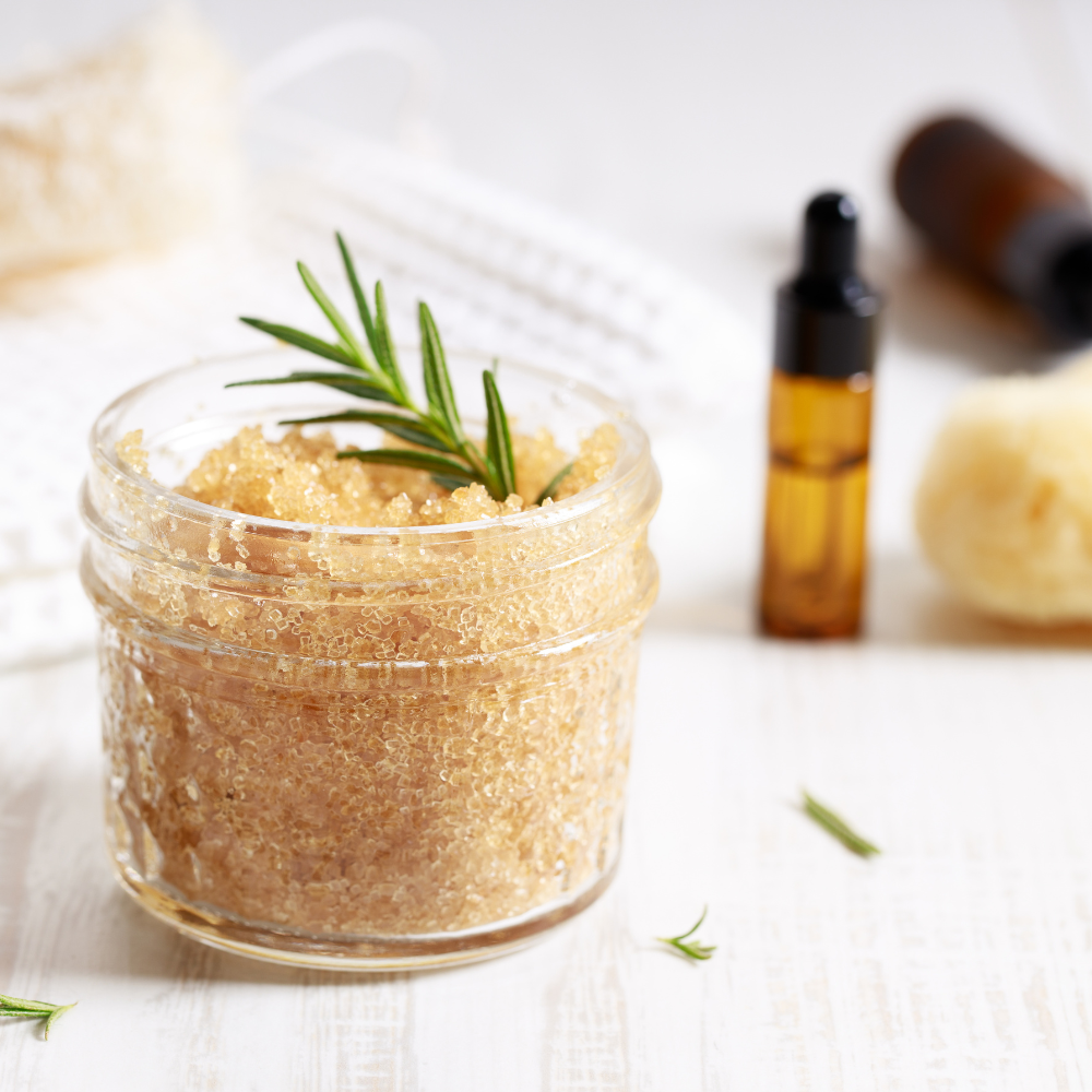 Homemade DIY scrubs in glass jars made with sugar and natural oils for a spa-inspired Mother’s Day gift