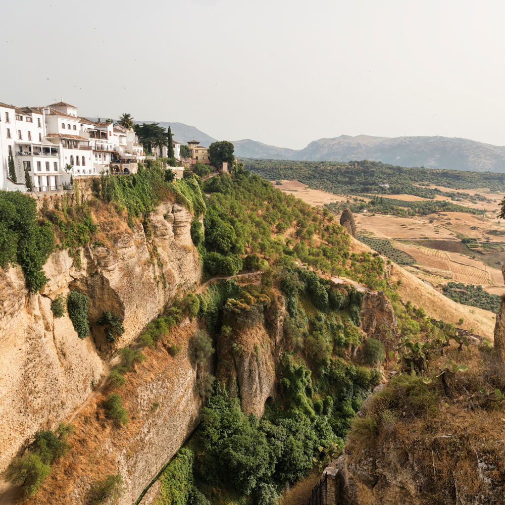 Ronda bridge spanning a dramatic gorge in Andalusia during a Spain road trip.