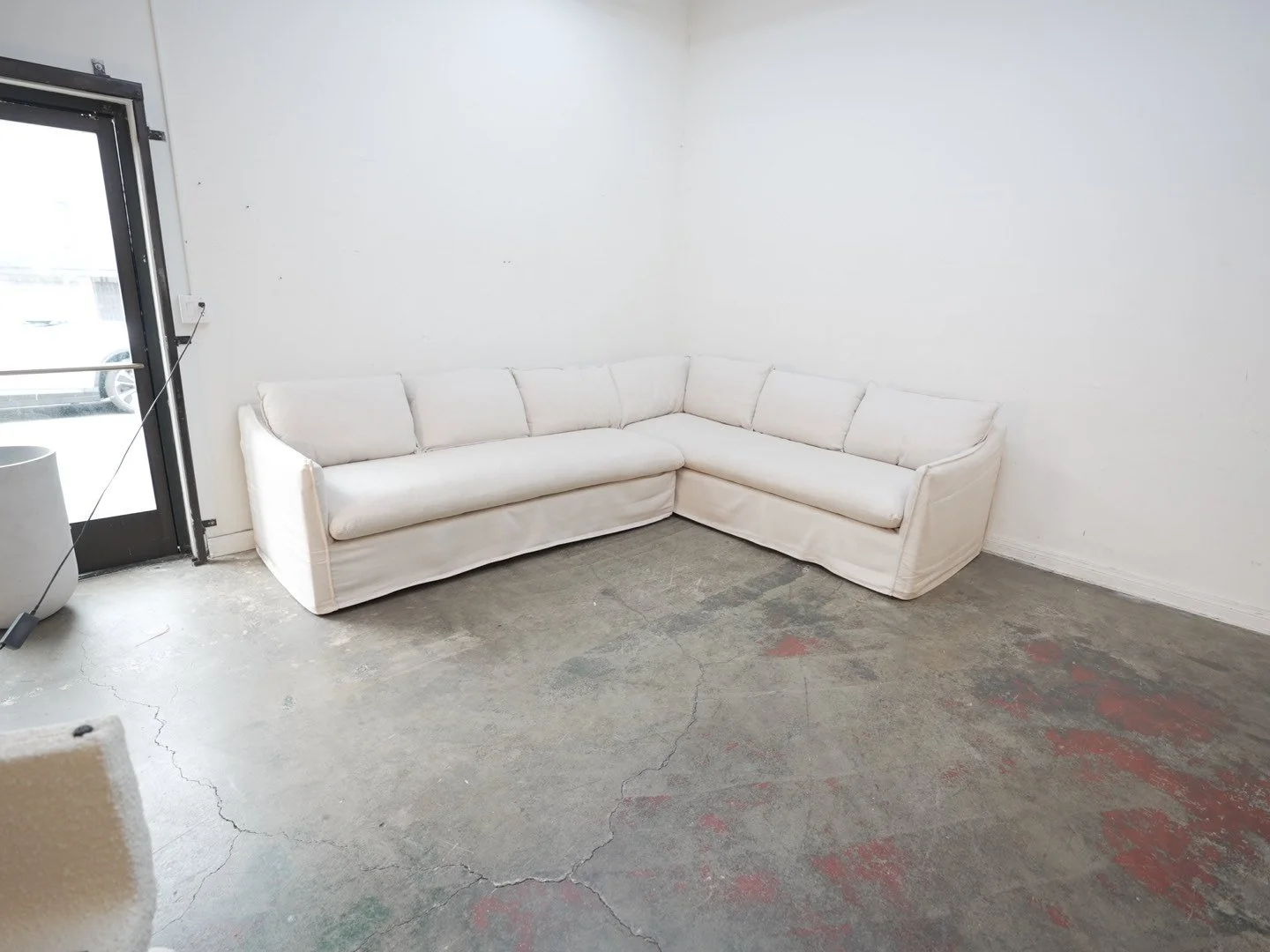 The Dune Sectional Slipcover Sofa in Performance Linen Weave Prairie