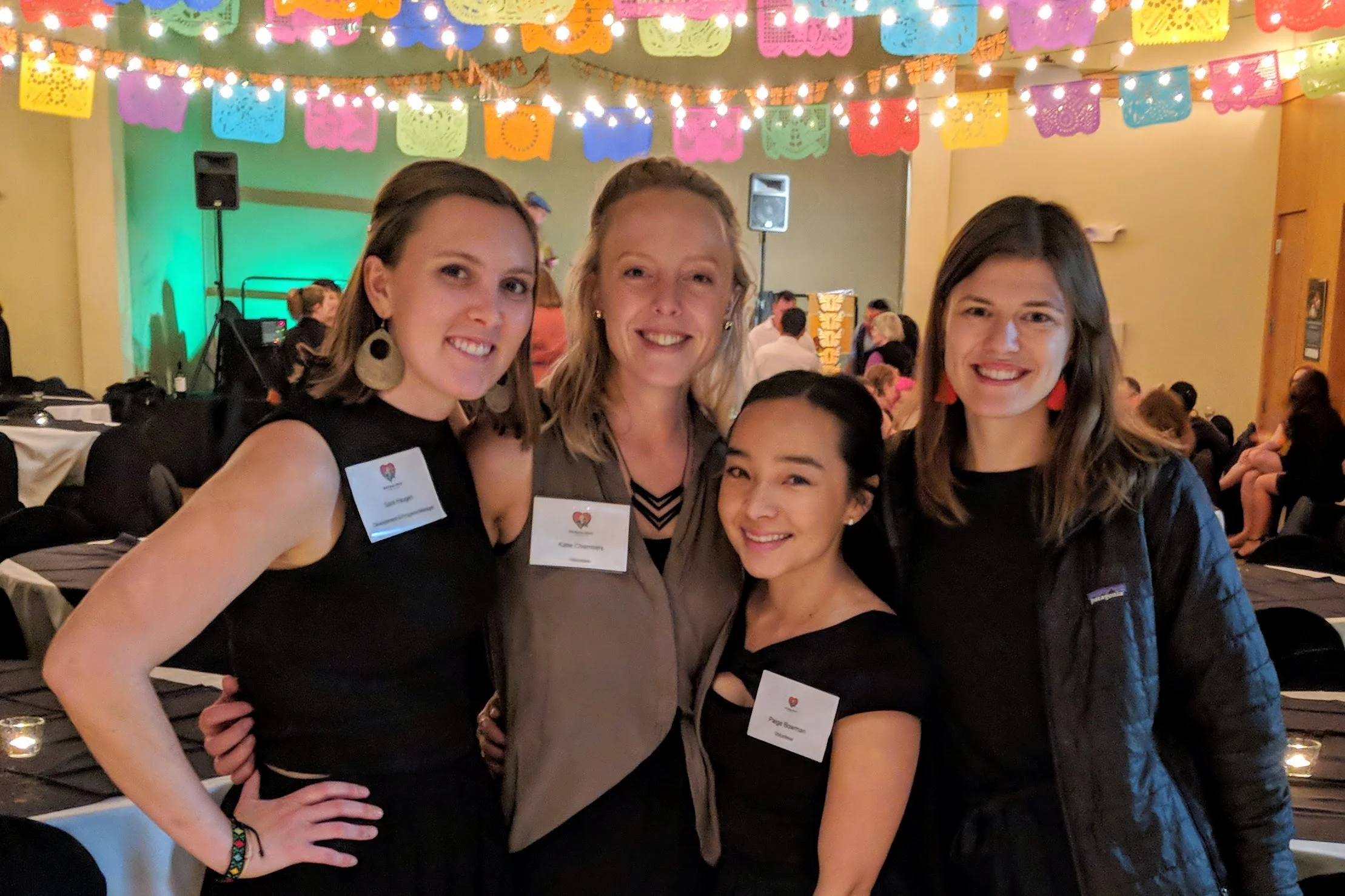 Sara Haugen, with volunteers Katie, Paige, and Zoë at the 2018 Fiesta
