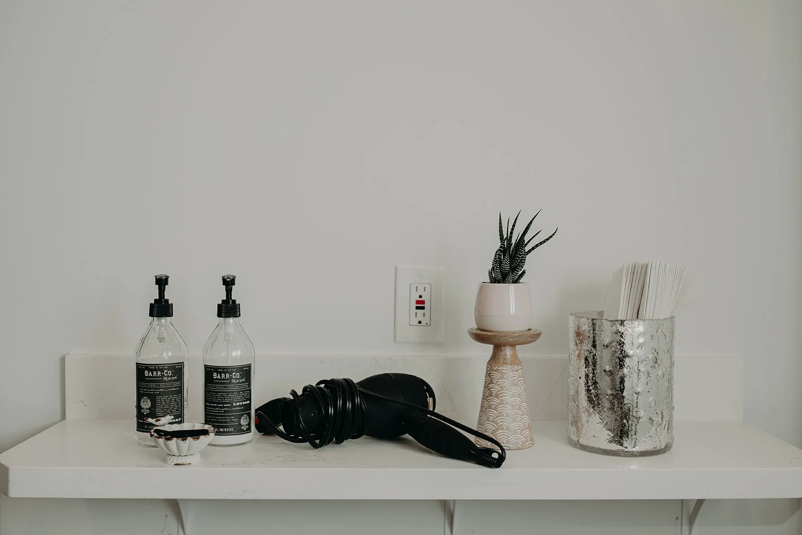 Fancy, updated, and fully stocked bathrooms for everyone complete with showers and top-of-the-line beauty products and equipment!