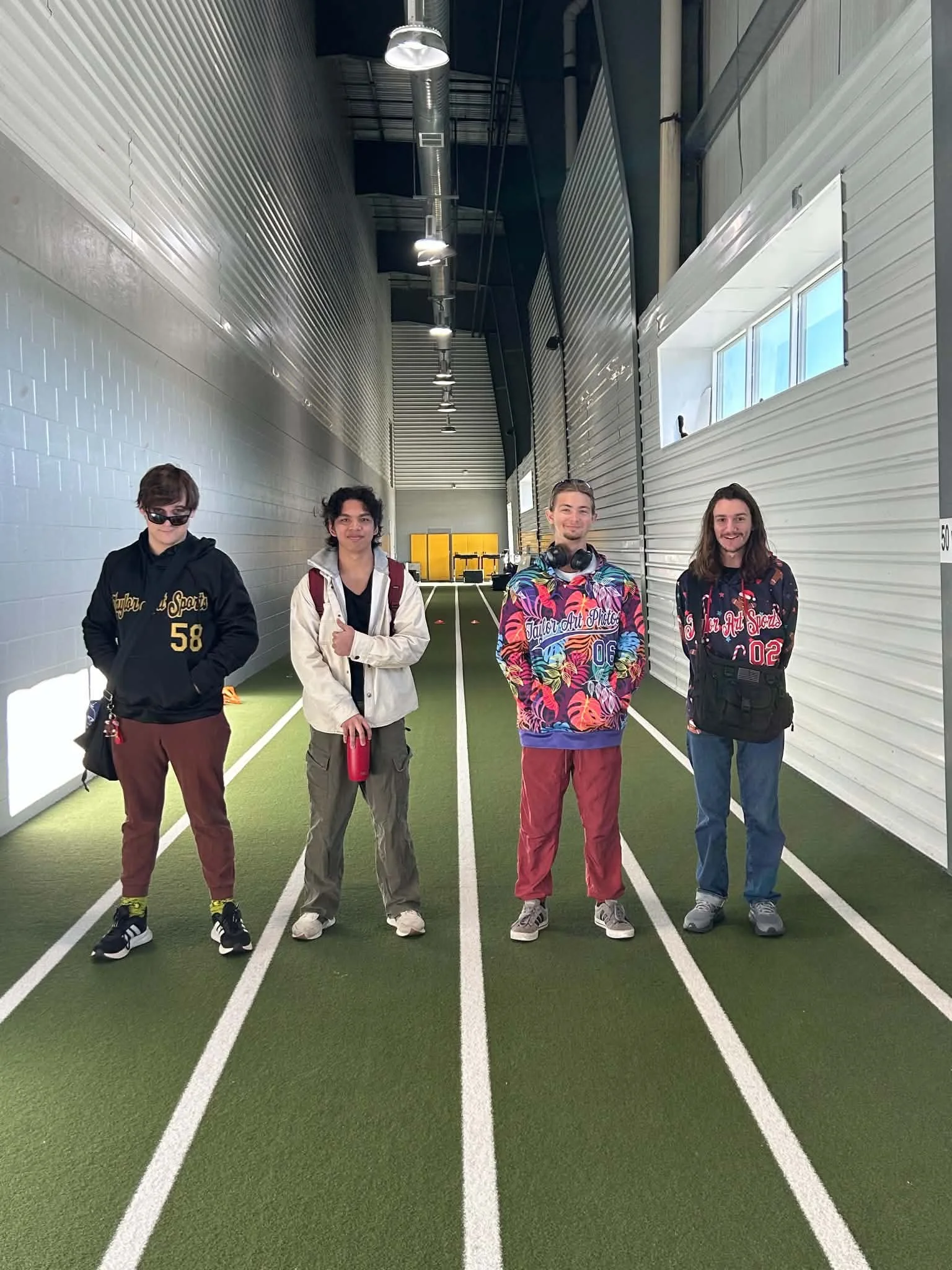 Taylor Art Photos and Taylor Art Sports production crew at AdventHealth Center Ice during the 2026 Sunshine State Synchro Classic.
