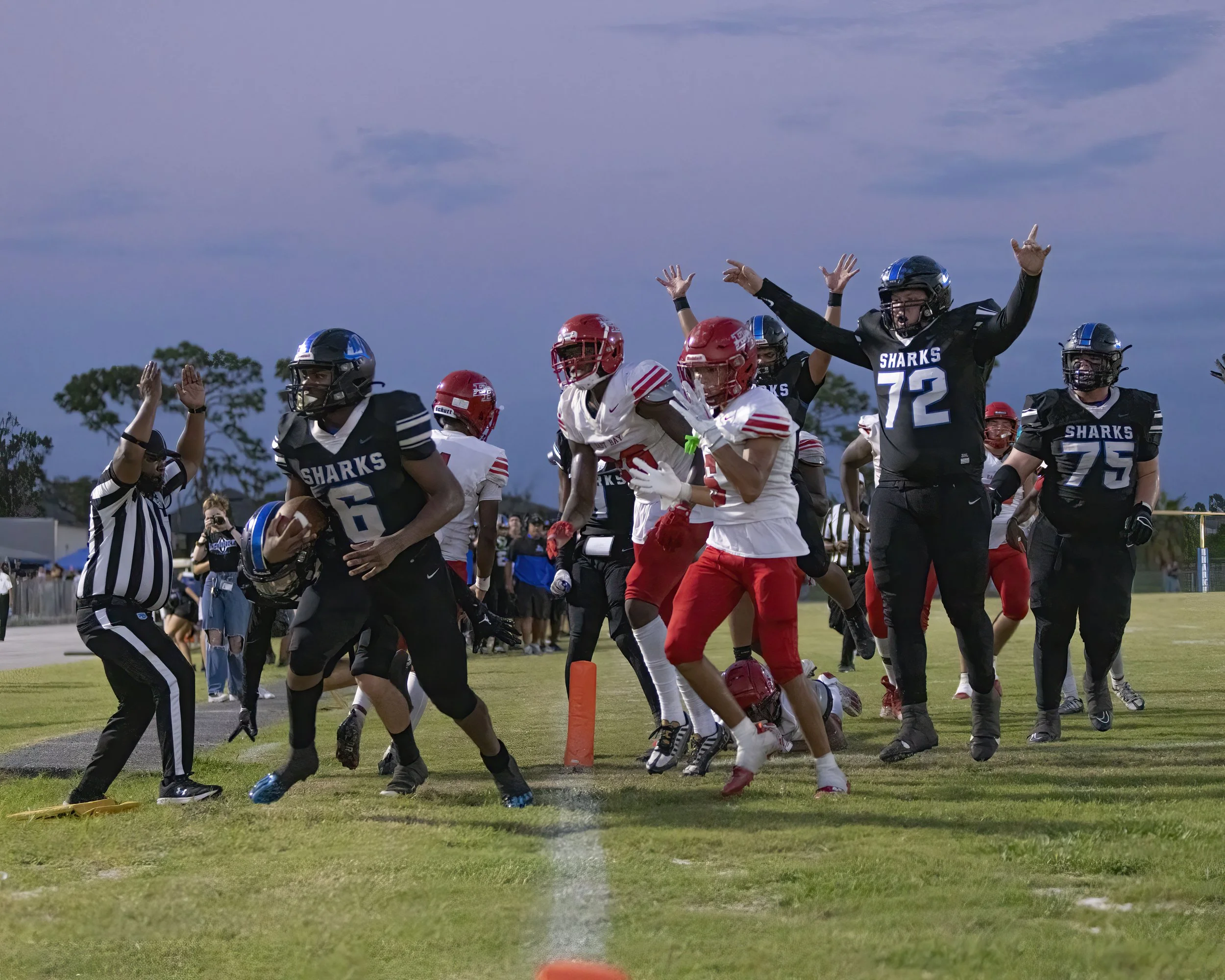 Riverview High School football player scores the game-winning touchdown during a varsity football game in Florida.