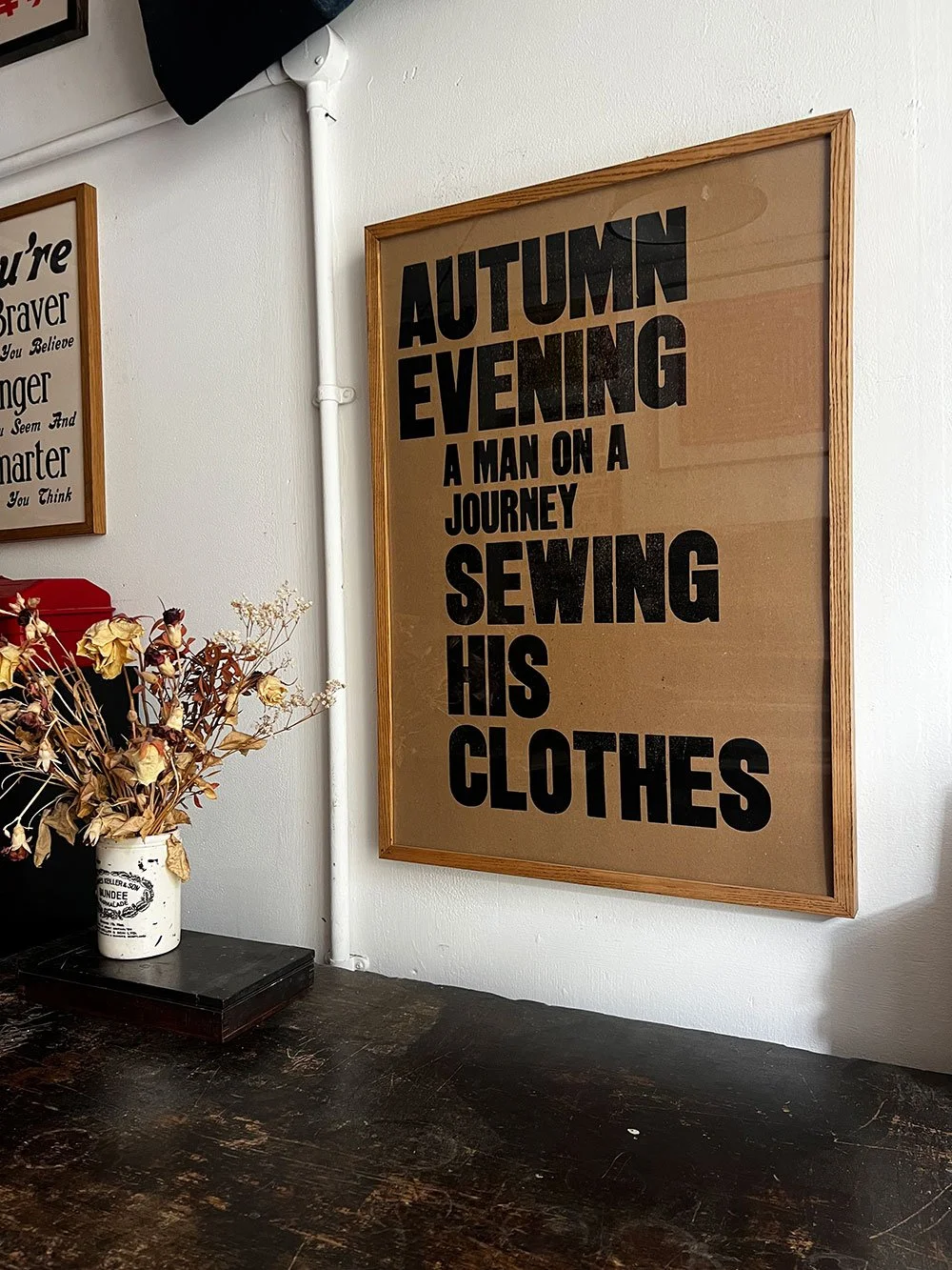 A-MAN-SEWING-HIS-CLOTHES.jpg
