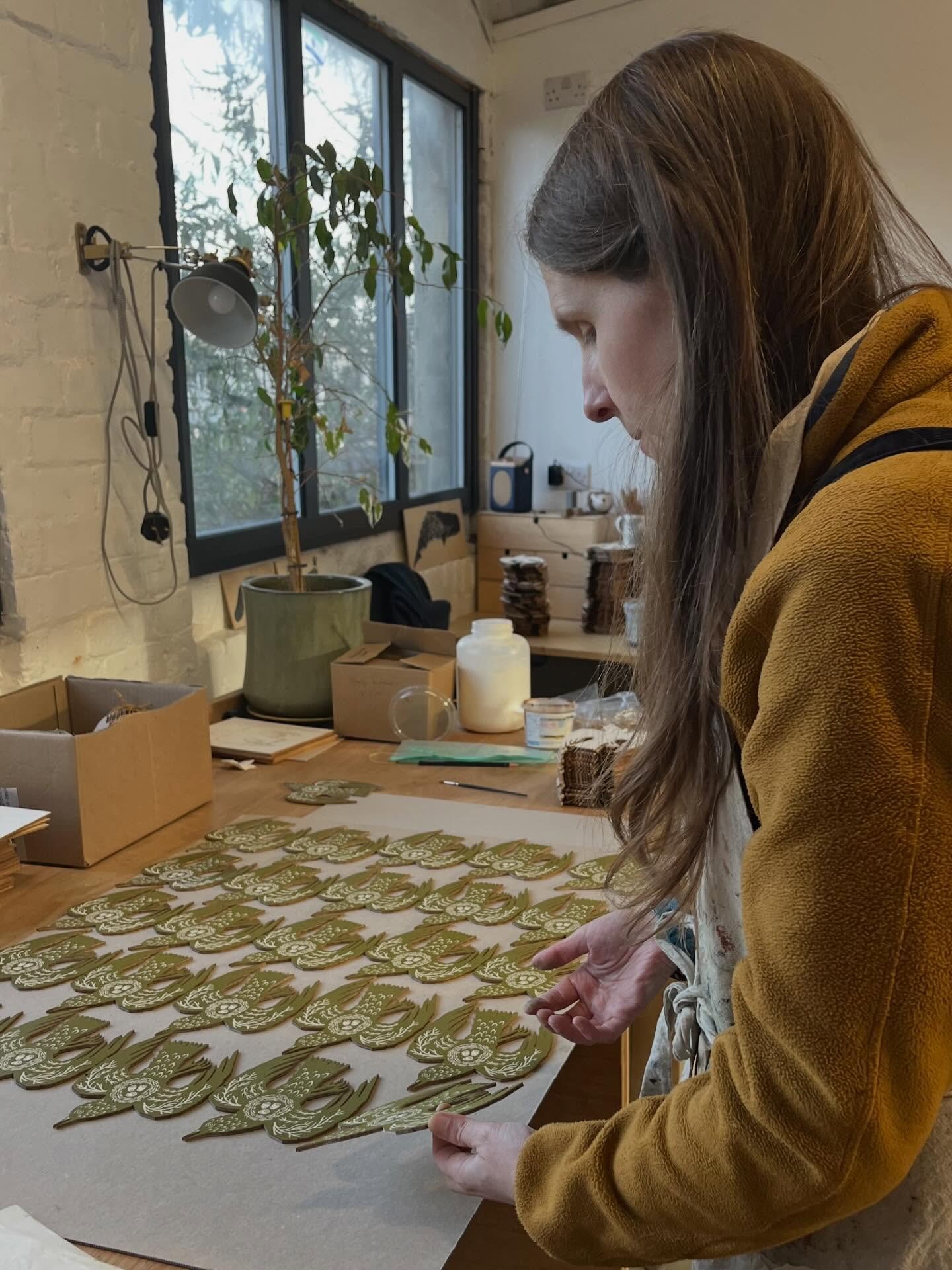 Some scenes from the studio today 🌞 Ruth &amp; Tony have been printing a fresh batch of woodland bird decorations in the winter sunshine. 

We love mixing up the ink for this particular decoration. It&rsquo;s a combo of quite a few different very br
