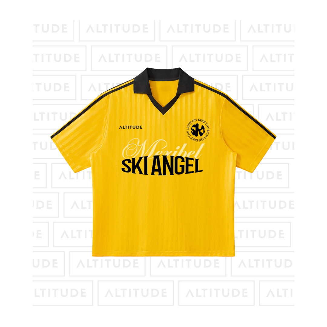Ski Angel X Keep the Light On Soccer Shirt (yellow front).png