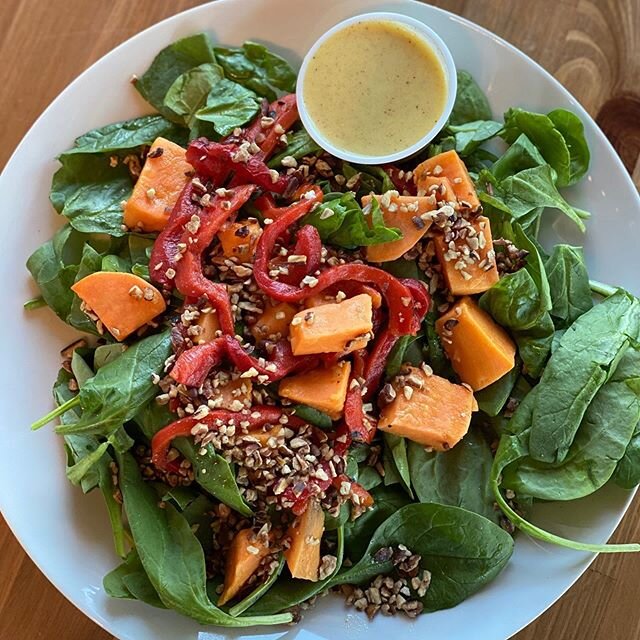 This is our new Southern Spinach Salad with #roastedsweetpotato, #babyspinach #toastedpecans #roastedredpepper and a spiced #citrusvinaigrette @wendellfallsnc