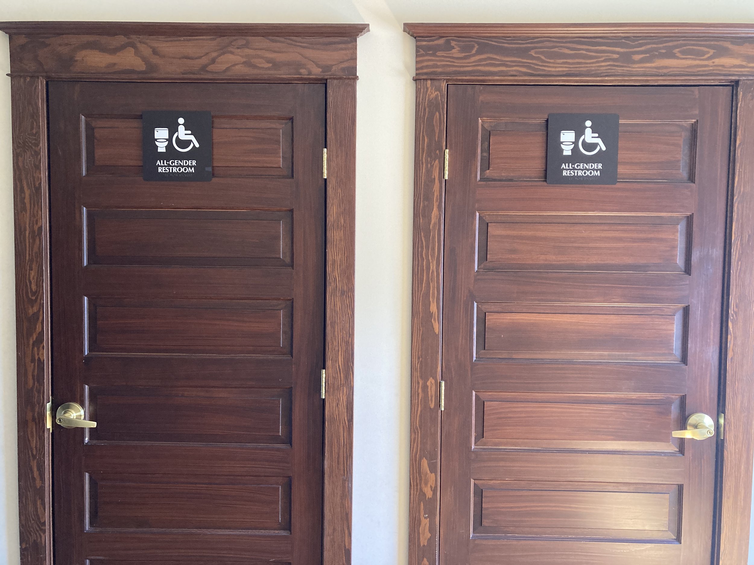 Gender neutral bathrooms, accessible from Heritage Room