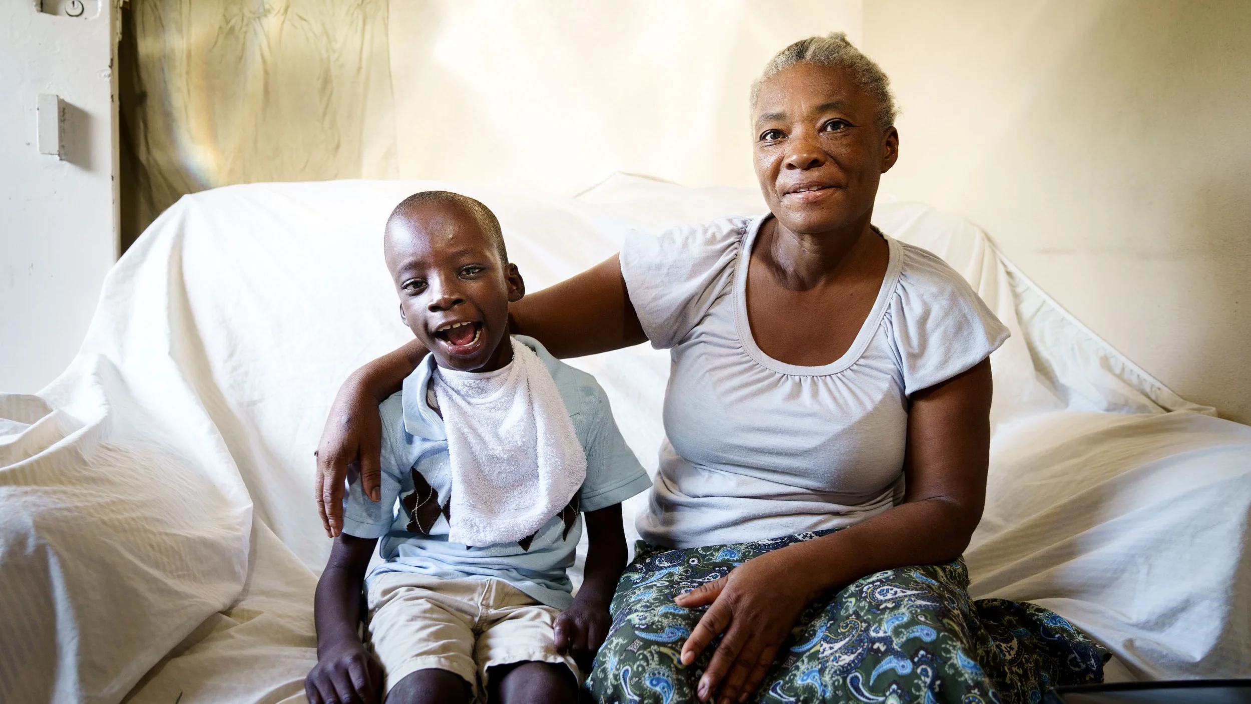 This little boy, with physical and mental special needs, was abandoned at the local hospital. LFBS was notified. Today, he has regular physical therapy, is cherished by his foster mom and is part of our outreach program. Photo by GBP Creative. © 2019 Shot In The Dark Media.