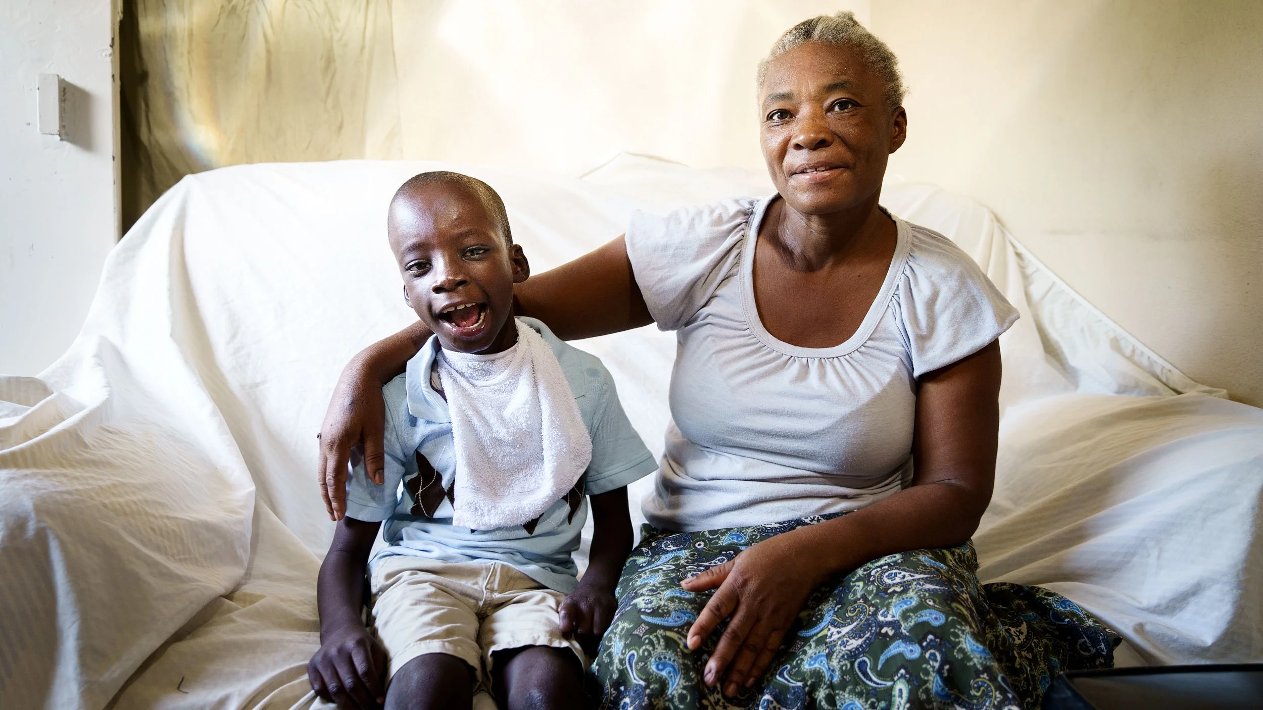 This little boy, with physical and mental special needs, was abandoned at the local hospital. LFBS was notified. Today, he has regular physical therapy, is cherished by his foster mom and is part of our outreach program. Photo by GBP Creative. © 2019 Shot In The Dark Media.