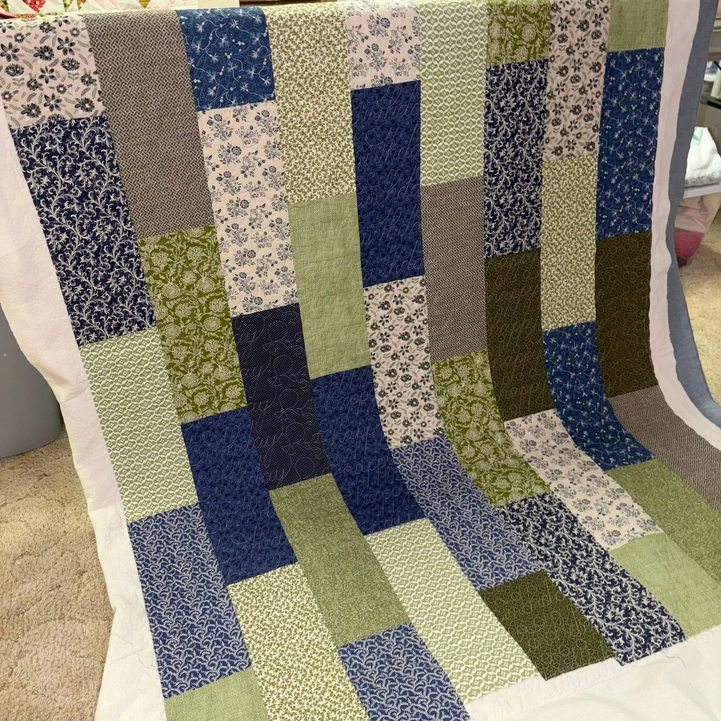 Shannon dropped off two quilts for me to quilt recently and this is the first one!

It is the Spice Drop quilt by Villa Rosa Designs. I love how it showcases the amazing print fabrics!

Shannon requested Birthday Wishes for the quilting - "happy
