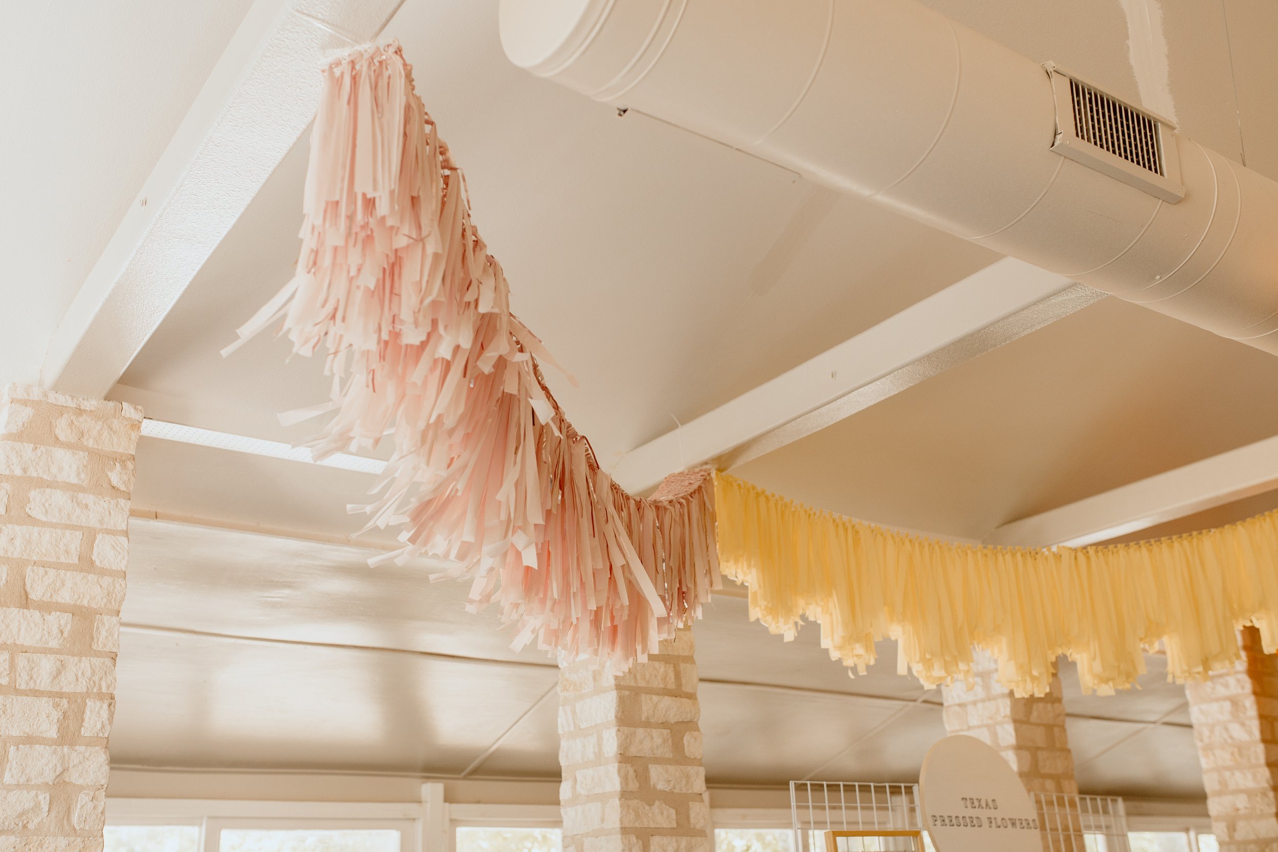 Peachy Streamer Decor for the Casa Blanca Open House in Round Rock, Texas —  Pop & Drop