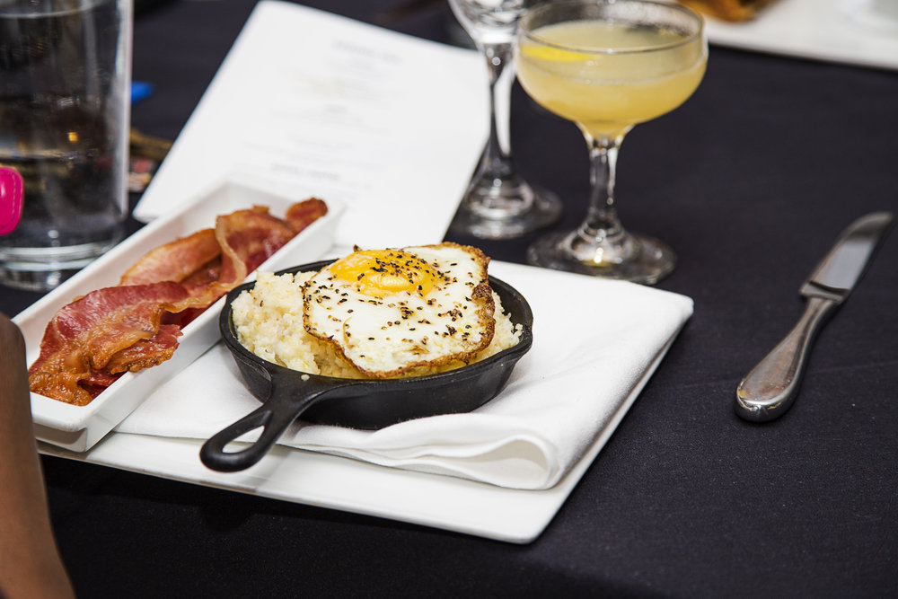 Salon Grits with a Sunny Side Egg and Bacon - Sucre.jpg