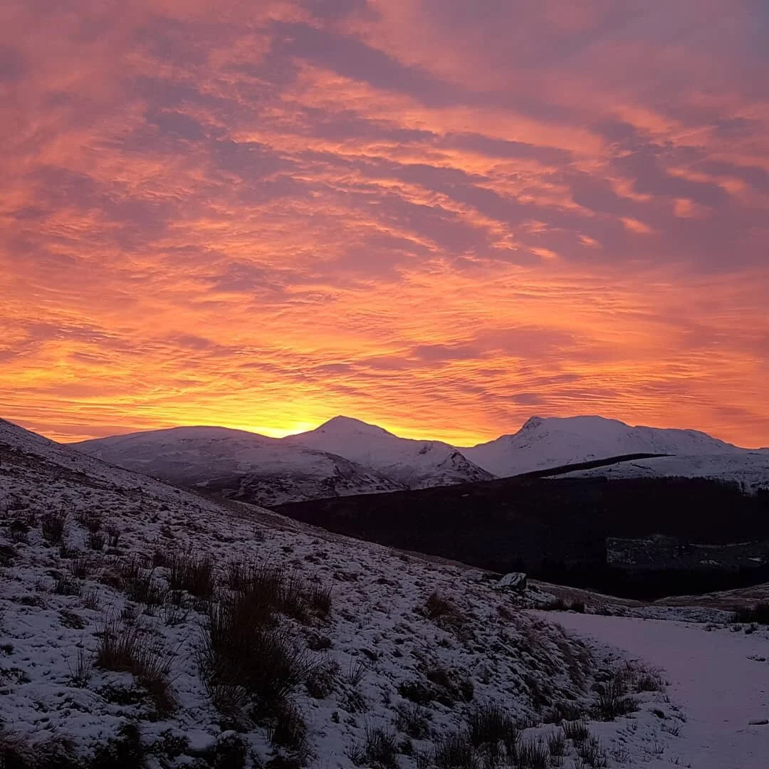 #Nofilter 

Throwback to a couple of years ago... an very early rise to be part way up the hills for sunrise... but wow it was worth it!! 

Vorlich &amp; Stuc a'chroin looking amazing under that colour!

#sunrise
#climbing #climbinglife #scrambling
#