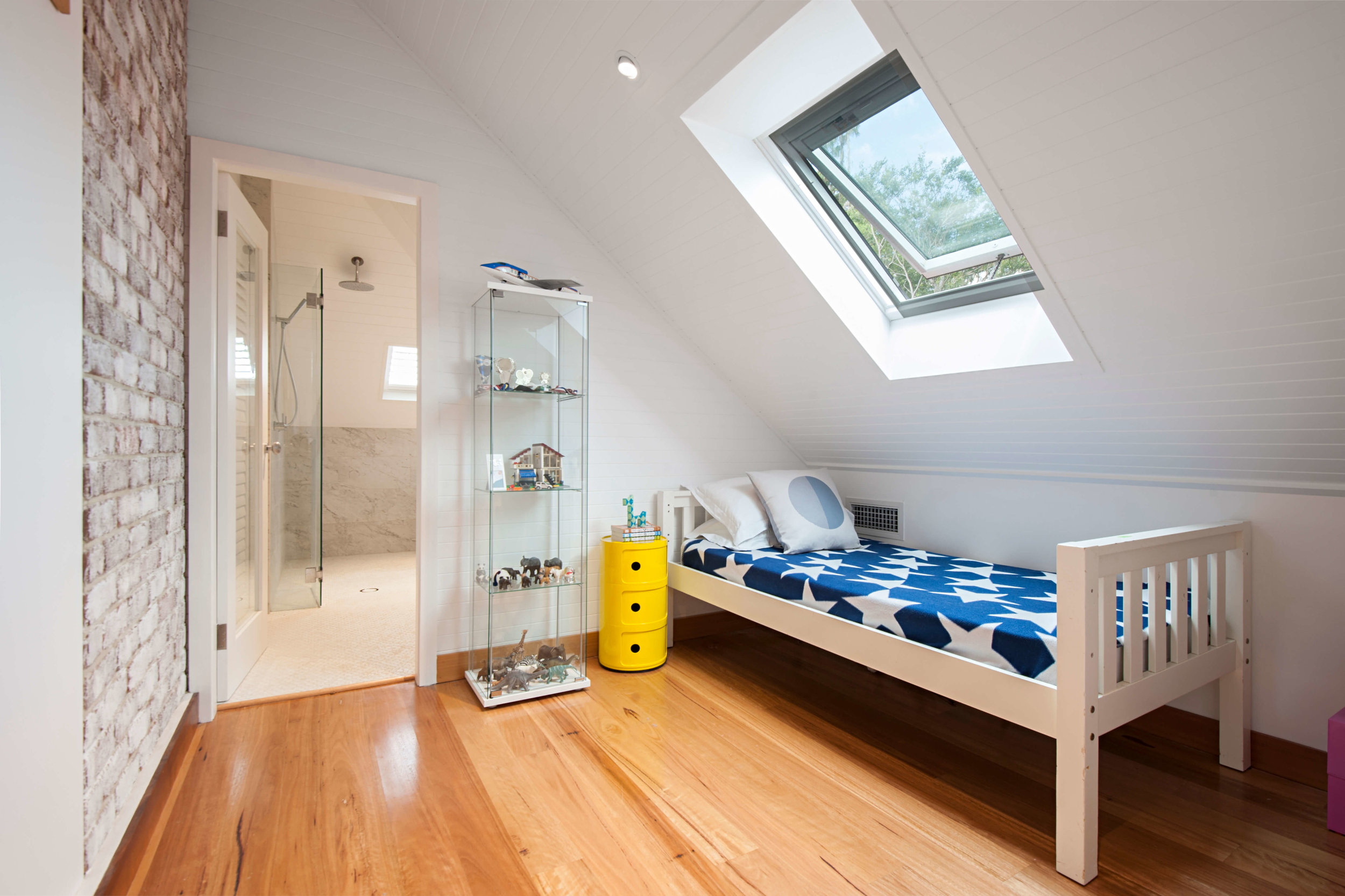 Attic converted into a child's bedroom and bathroom
