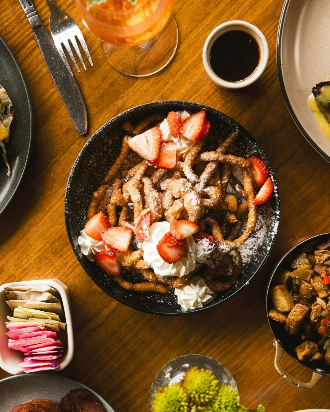 Whether you're into sharing or not - our French Toast Funnel Cake is the perfect dish to snack your way through Brunch with! 

See you at 11!