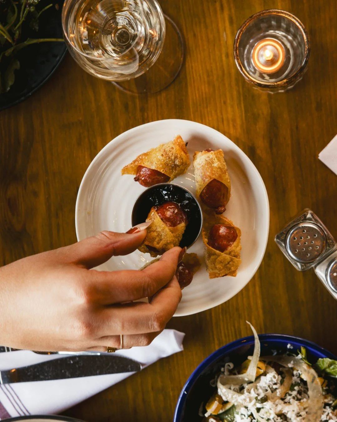 'Tinis + Weenies continues TONIGHT! Come on down for $10 House Martinis or Manhattans and $10 Chorizo Pigs in a Blanket all night long!