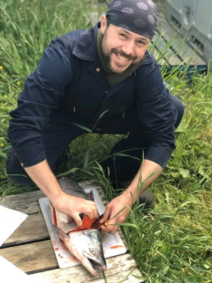 Darren Lobo prepping fresh salmom
