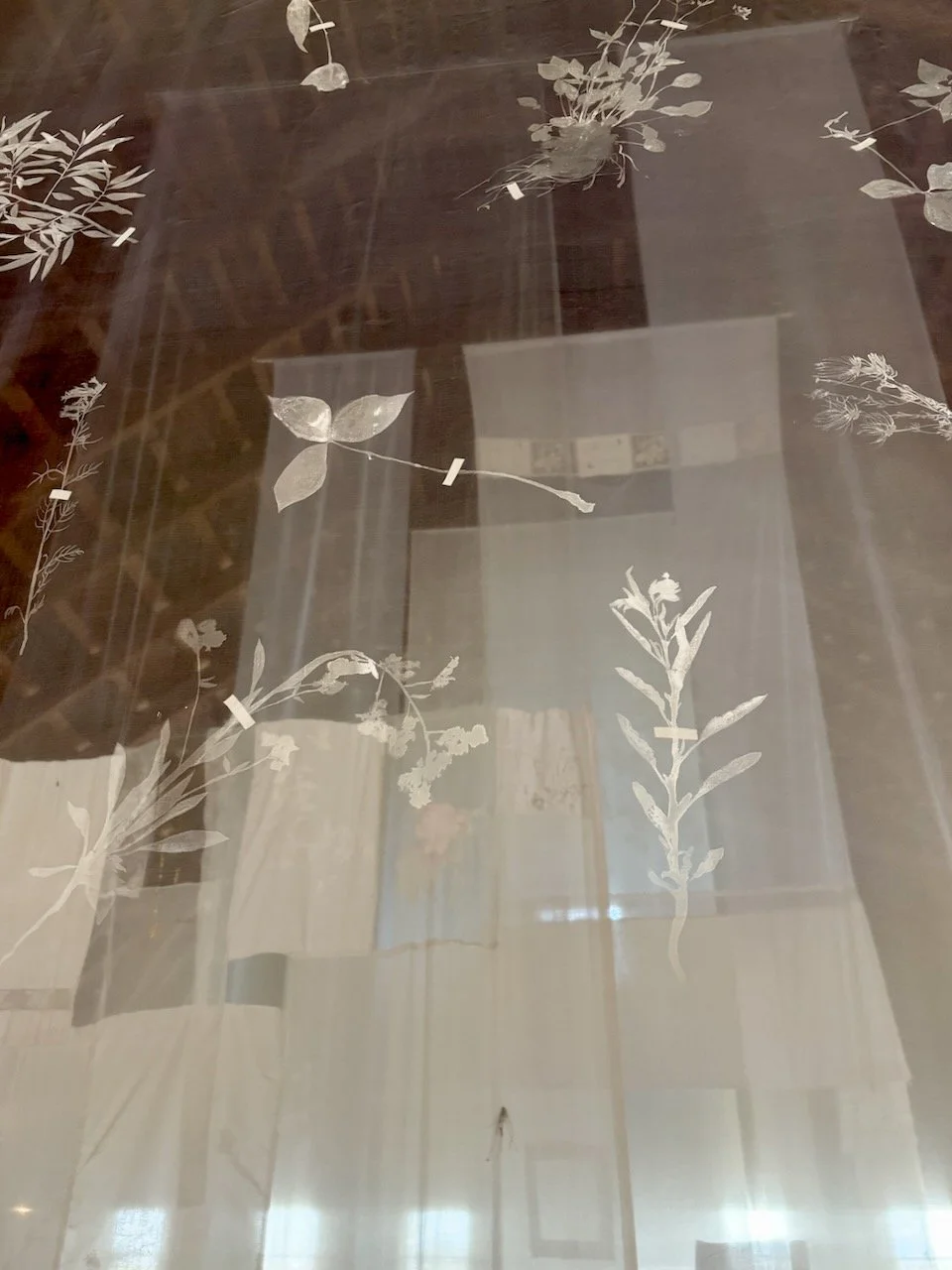 Eidolon (Installation View)  2025  204" x 48" (aprox. size of ea. Banner)   Mixed media on Fabric