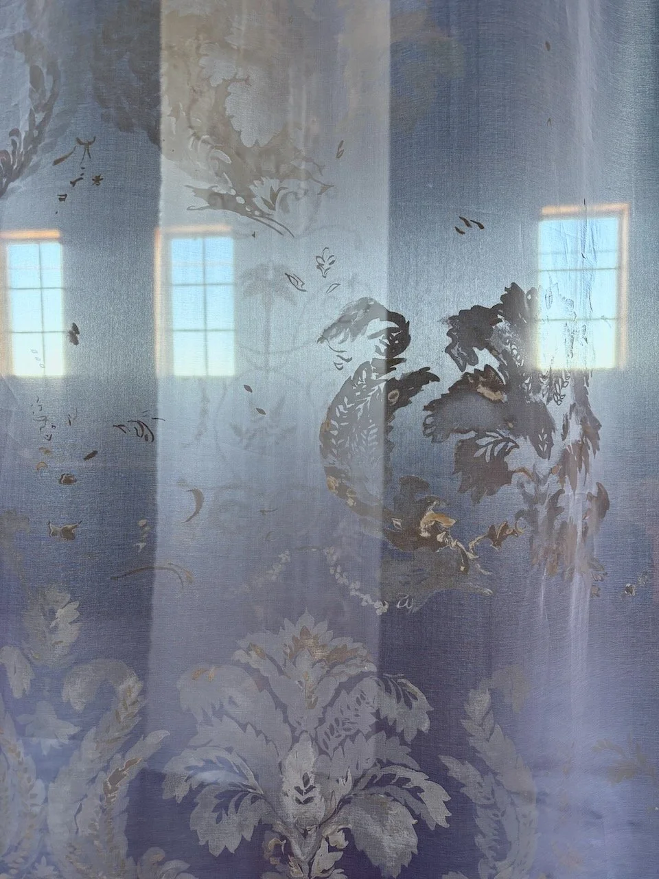 Eidolon (Installation View)  2025  204" x 48" (aprox. size of ea. Banner)   Mixed media on Fabric