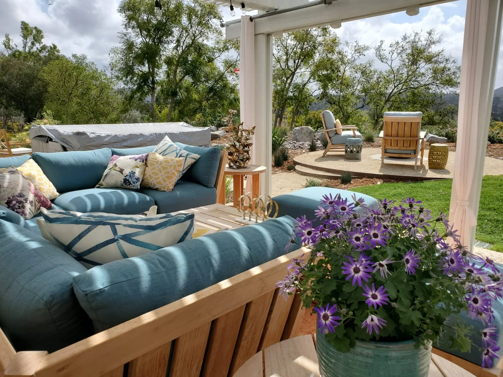 Pergola Lounge beside Pollinator Planting