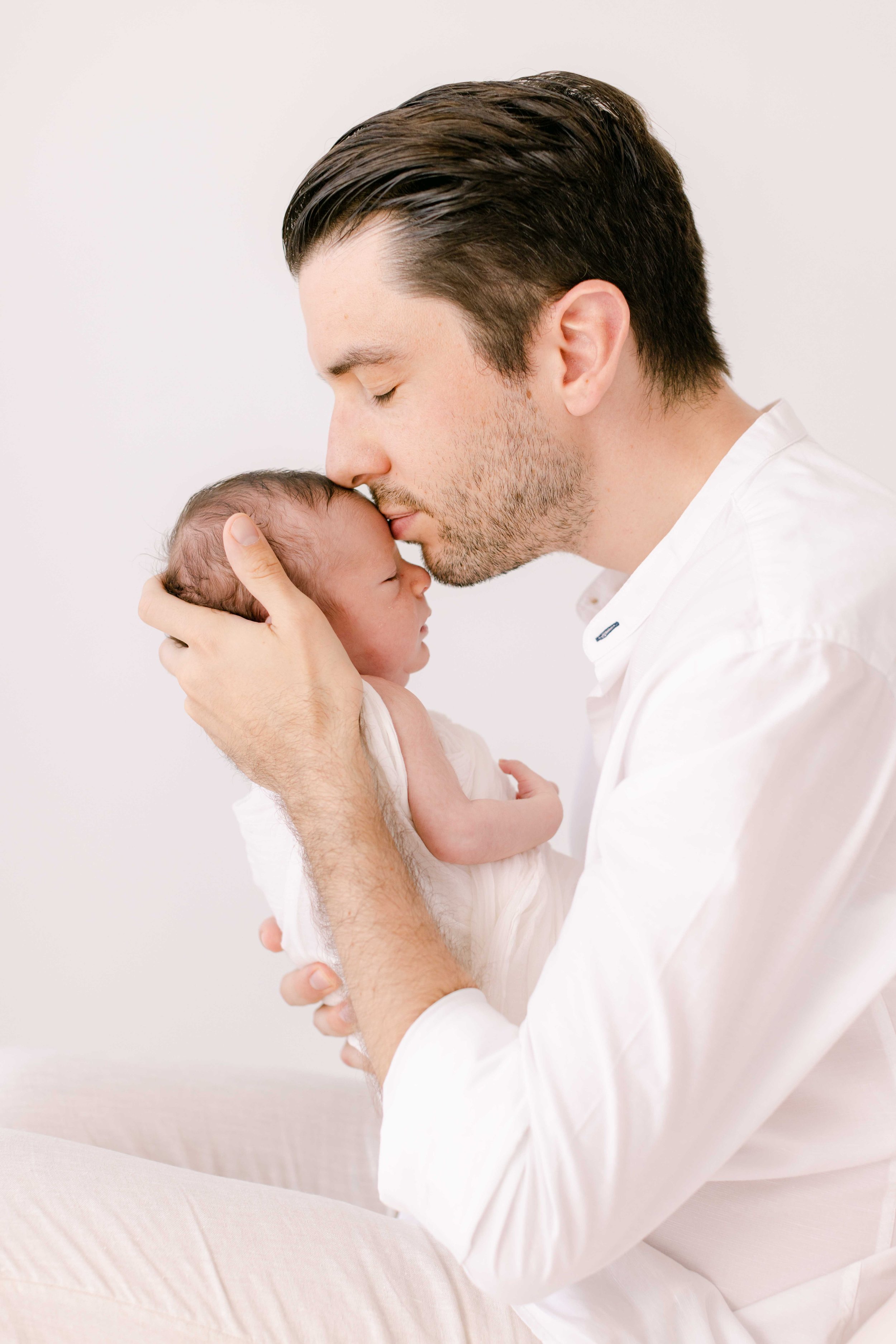 Neugeborenen & Baby Fotoshooting mit Mama & Papa in Zürich