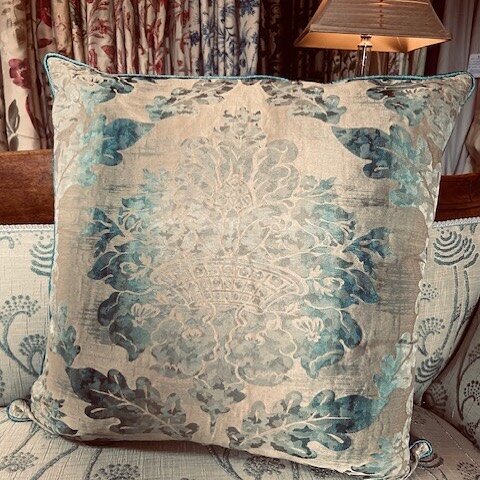 An example of a bespoke cushion made from a vintage Olympia Mariano Fortuny fabric at Hamilton House Interiors. Fortuny makes the finest printed fabrics in the world, handmade in Venice since 1907. This cushion was made to order and is piped in a bea