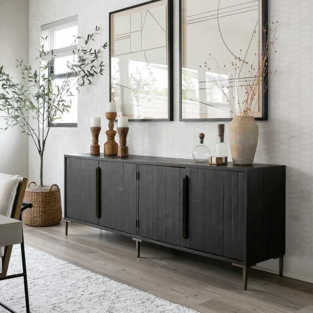 Ebony wood, marble mosaic, concrete table and some mixed marterial chairs. A good mix indeed! 

Dining room inspiration. Dining room. Transitional dining room. Orange County interior design. Orange County interior designers. SoCal interior design. So