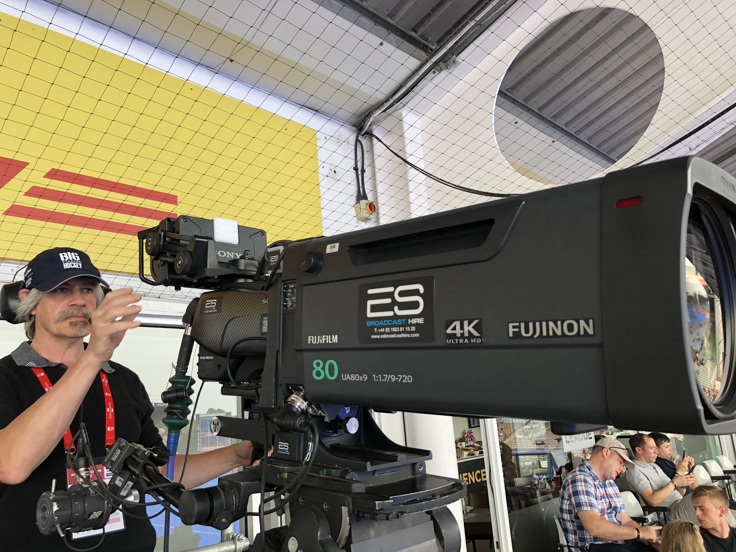 Camera man wearing BSH cap.JPG