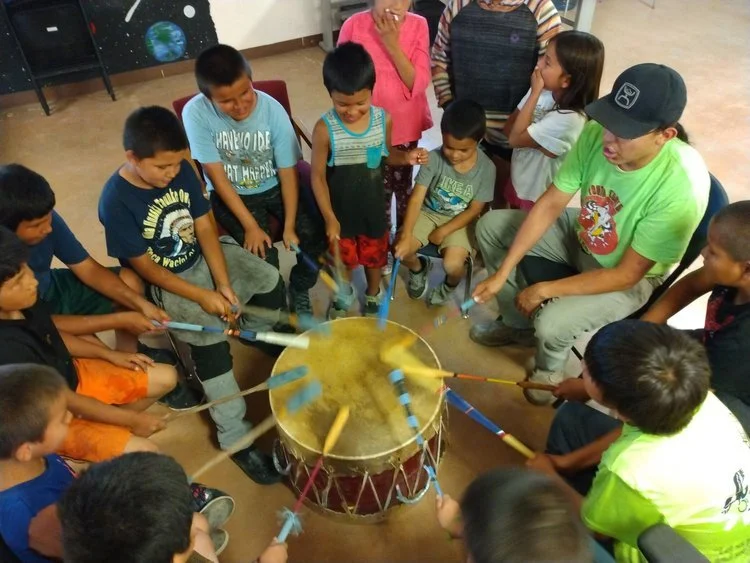 Youth_Playing_Drums.jpeg