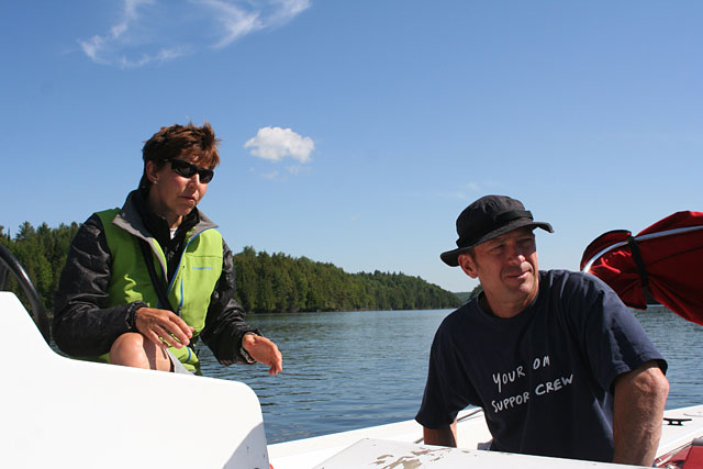 Time for a coaches’ conference. Lisa and Troy discuss ways to approach a catch timing issue.