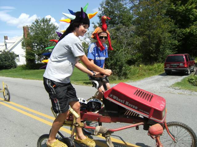 Ben Gillott and Matthew Lawlor do their best to steer the tractor-cycle. They re-ended the real tractor immediately ahead of them too many times to count.