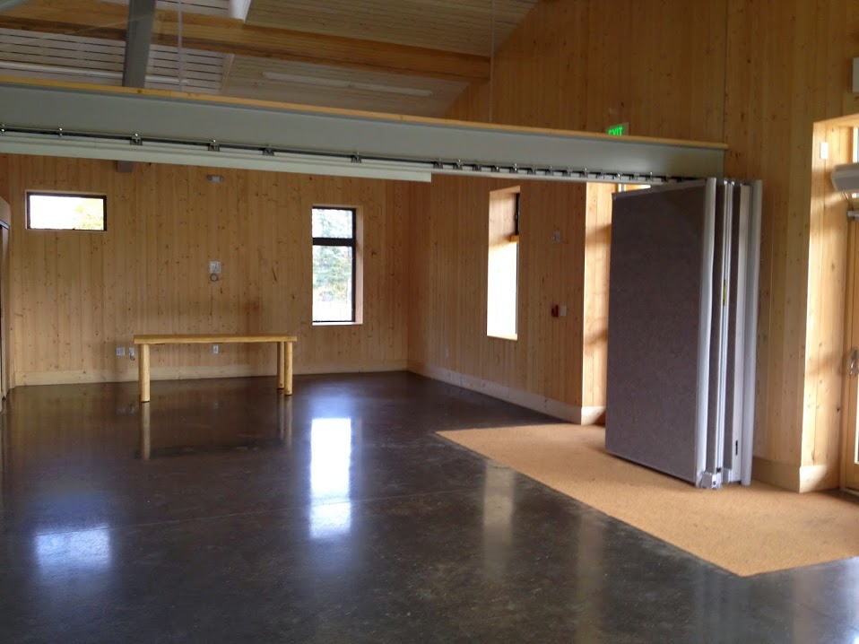  Moving forward through the lodge side of the building we reach the classroom area, with fabric dividers that make the space versatile for a number of uses. 