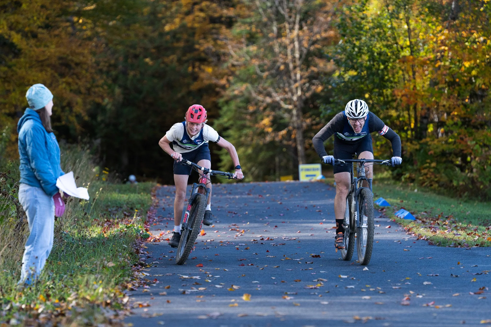 Bowman Suddaby (left) and Matt Williams sprint for second in the expert men's bike. Williams took it by 0.9 seconds.