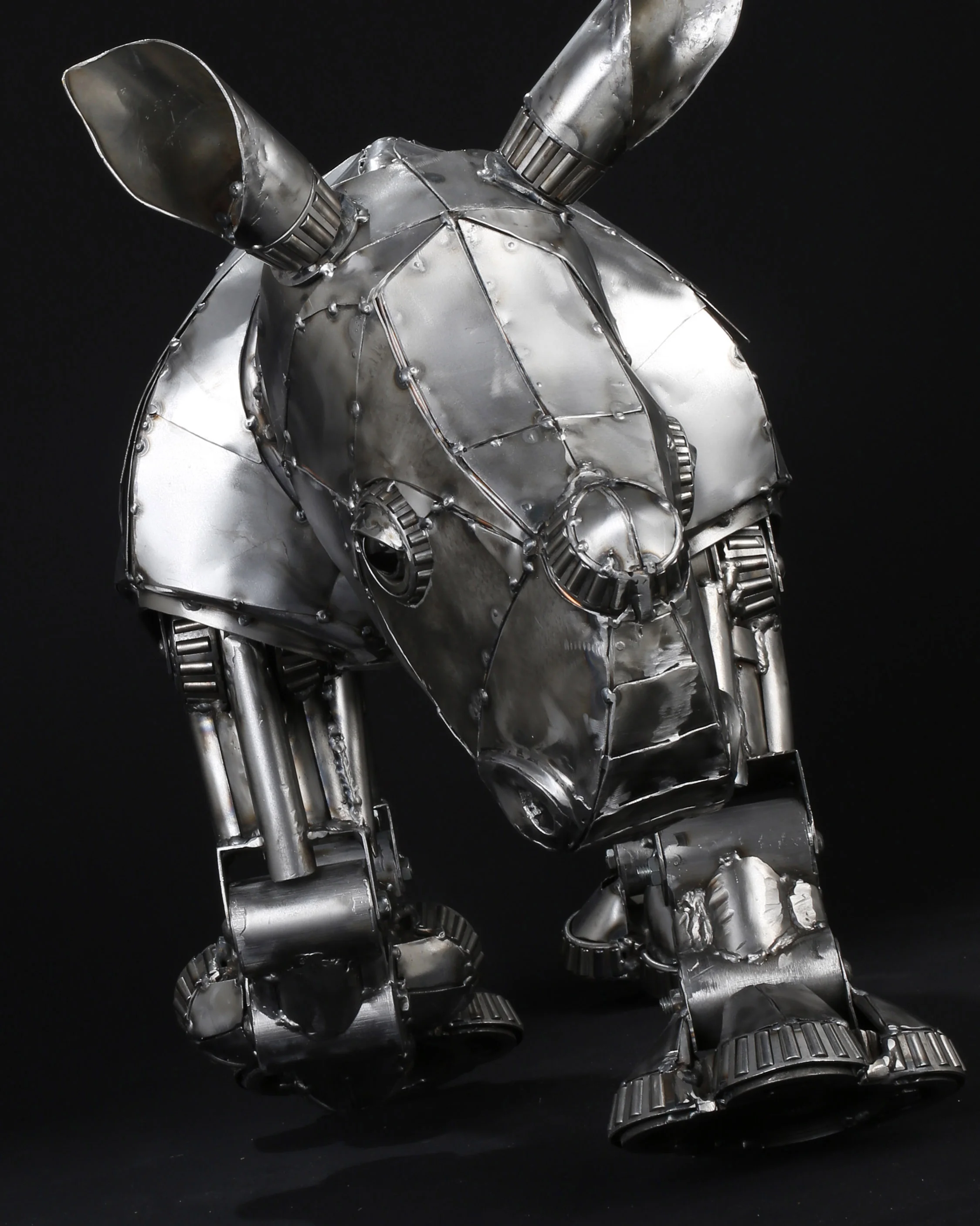 Baby Rhino Metal Sculpture - Charging.jpg
